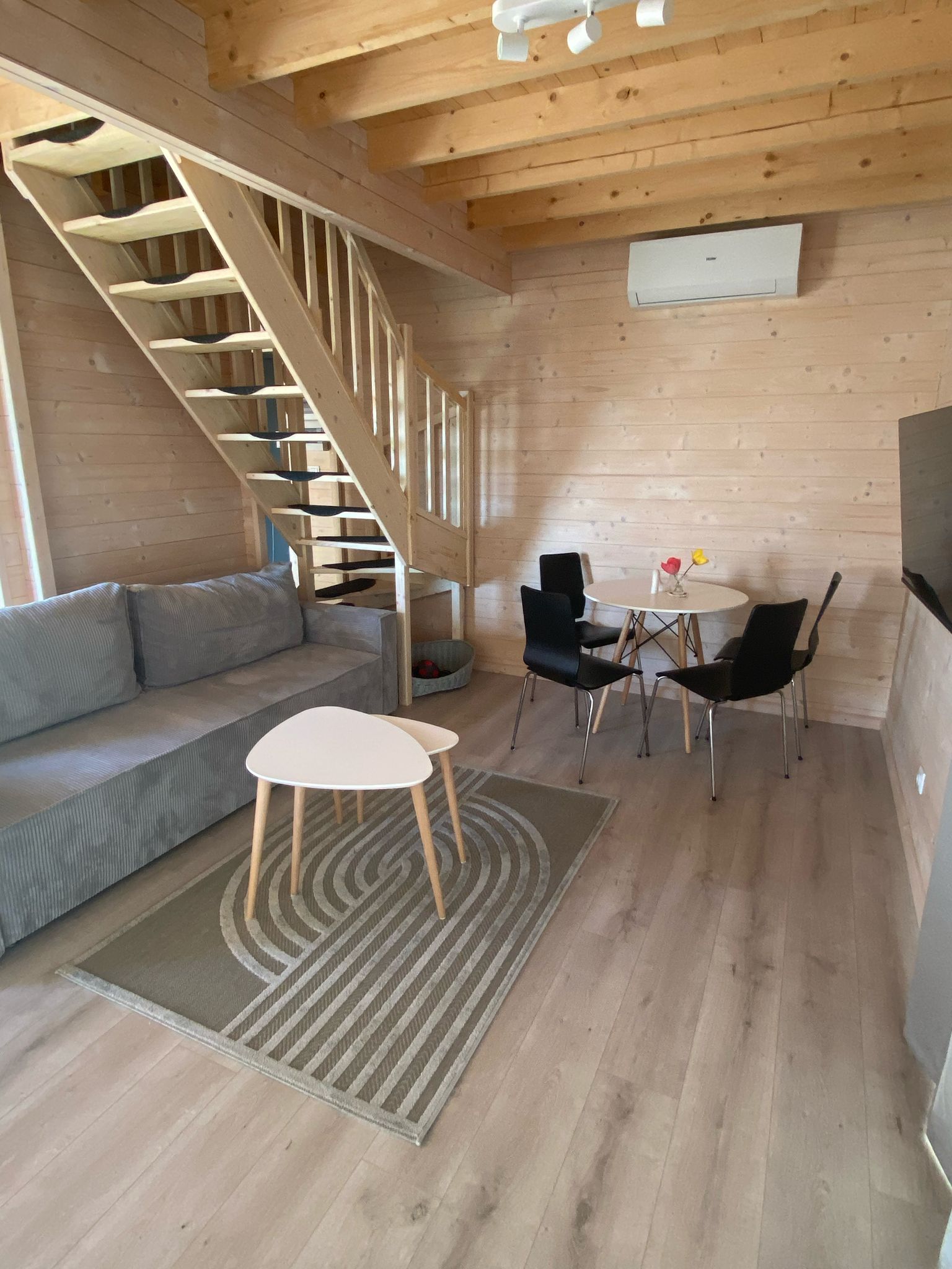 Ferienhaus Rewal Relax gemütliches Wohnzimmer mit Kamin